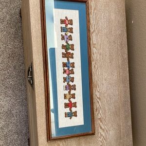 Cross stitched bears artwork.
